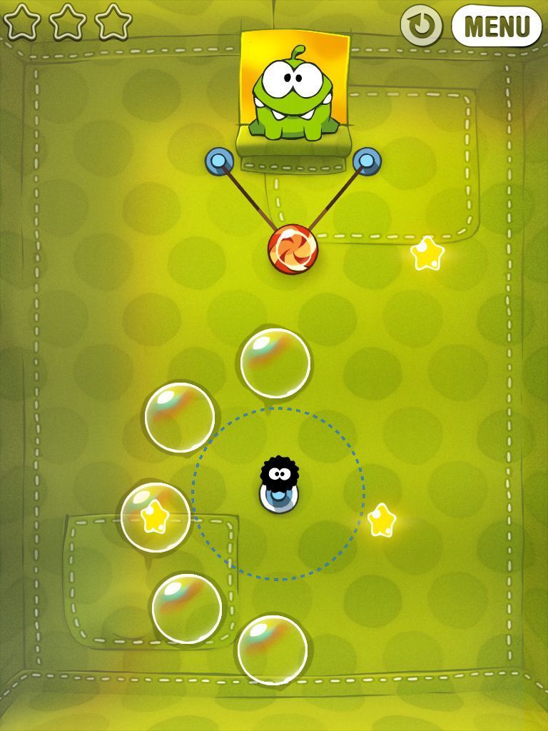 At one point, we made one small change to Cut the Rope. The objective of the game is to feed candy to a little green creature named Om Nom while collecting stars.